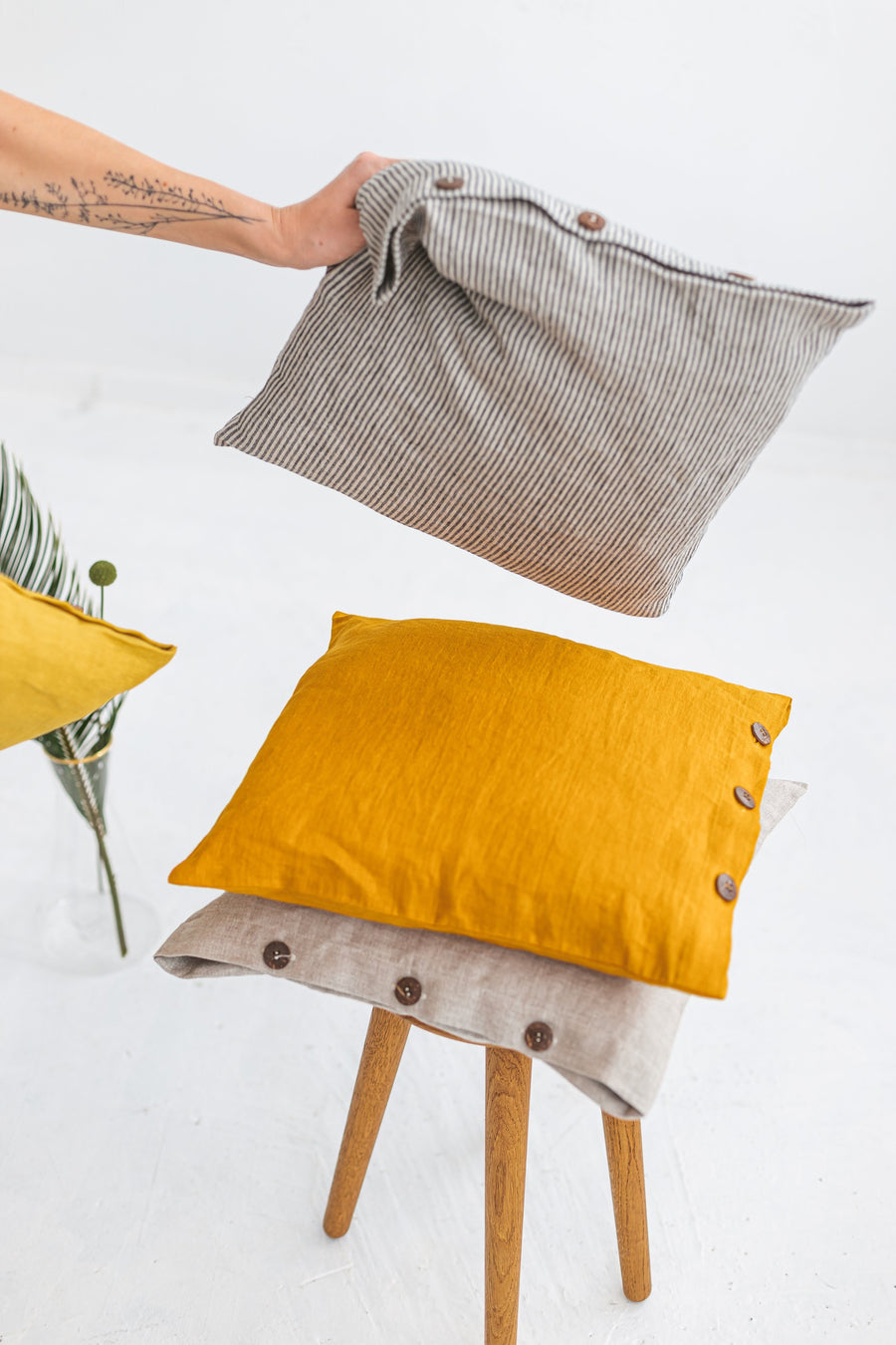 yellow linen pillow cover with buttons